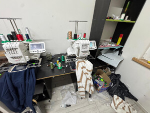 Stołeczni policjanci zlikwidowali szwalnię, w której podrabiano znaki towarowe światowych marek