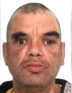 Zdjęcie przedstawia fragment twarzy mężczyzny o ciemnych oczach i brwiach.